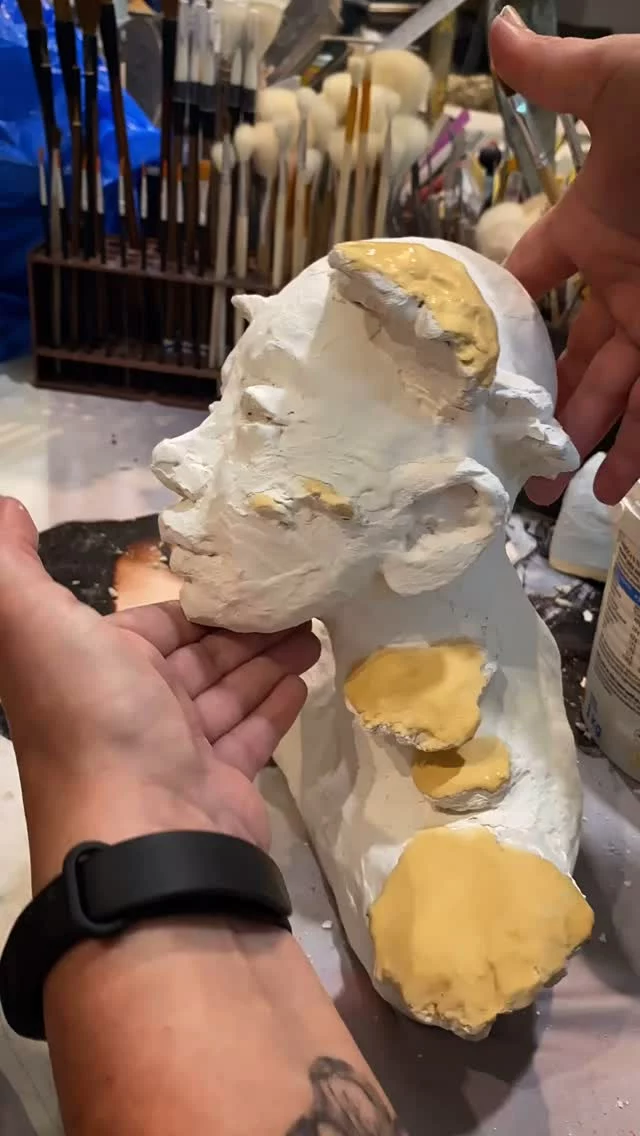 Before the sculpture meets the fire, it must receive its final layer - the glaze.
This is where the alchemy begins.

Raku glaze is unpredictable. It offers no guarantees. But it gives you magic.

It’s a moment that teaches me, every time, to trust.
A moment when I’m fully aware of my intention,
when I know what result I’d like to see -
but I surrender, in humility and faith.
Already at this stage, I’m willing to embrace both failure and spectacular success.

I’ve been working as a ceramic artist for nearly 15 years and if I’ve learned anything, it’s that I know nothing.
Already now, I let go of control.
Whatever happens, happens.

Soon - the fire. The transformation.
But first - this.
This moment, when the clay is sealed in its final skin…
And waits.